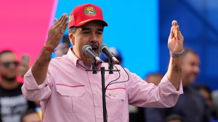 maduro-dances,-sings-to-‘don’t-worry,-be-happy’-at-rally-as-trump-escalates