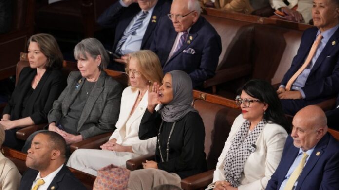 omar-says-her-state-of-the-union-guest-was-arrested-for-standing-during-trump’s-speech