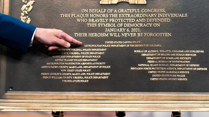 jan.-6-officers-argue-capitol-plaque-‘hidden’