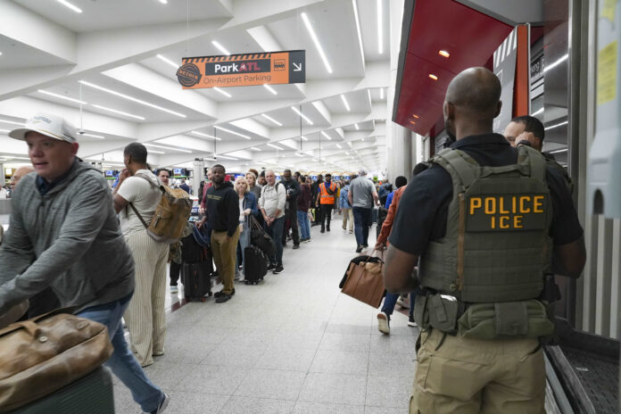 ‘the-pressure-is-untenable’:-trump’s-deployment-of-ice-agents-to-airports-ramps-up-shutdown-fight
