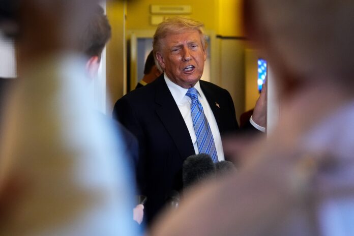 justice-department-expands-trump-settlement-to-cover-his-tax-audits