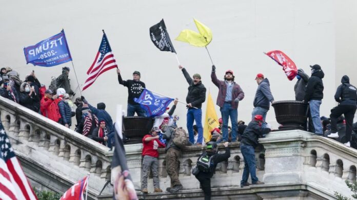 doj-defends-deleting-releases-tied-to-jan.-6-attack-from-website:-‘we-are-proud’