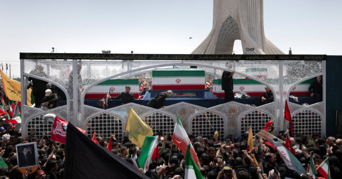 joining-a-human-tide-of-mourners-flowing-through-tehran’s-streets